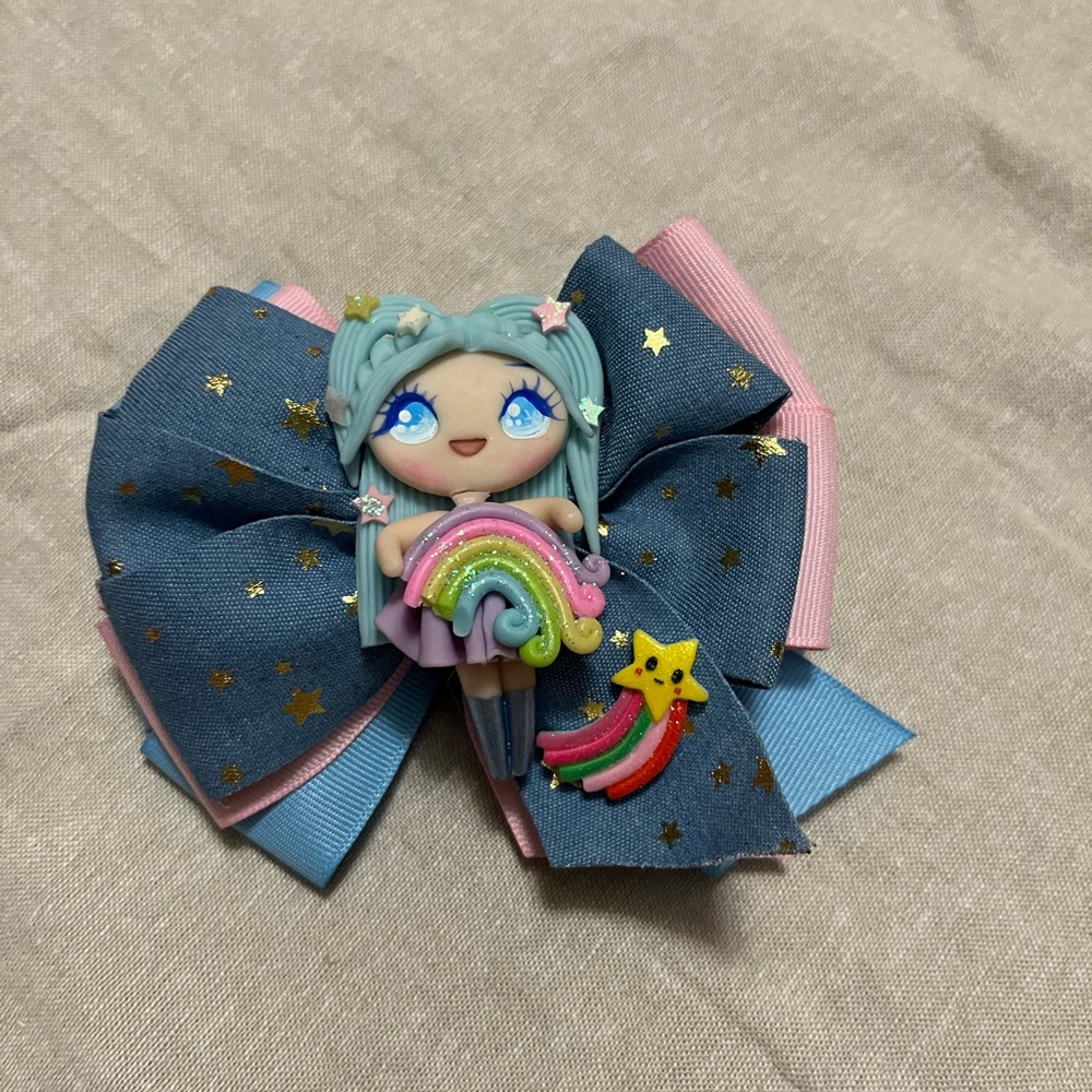 Blue and Pink Starry Hair Bow with Rainbow Design